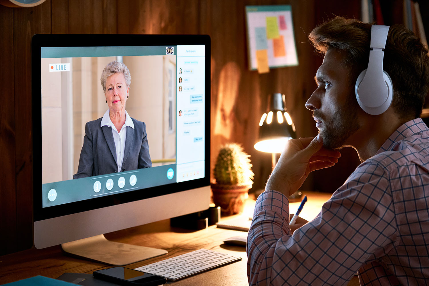 Forensic Document Examiner Training Program Male student on zoom call for training program with Kathy Carlson